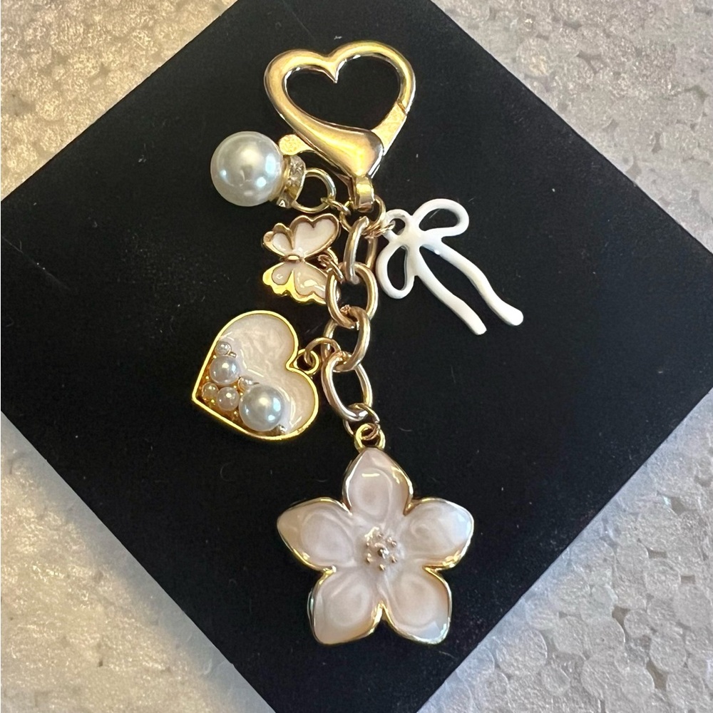 White floral bag charm